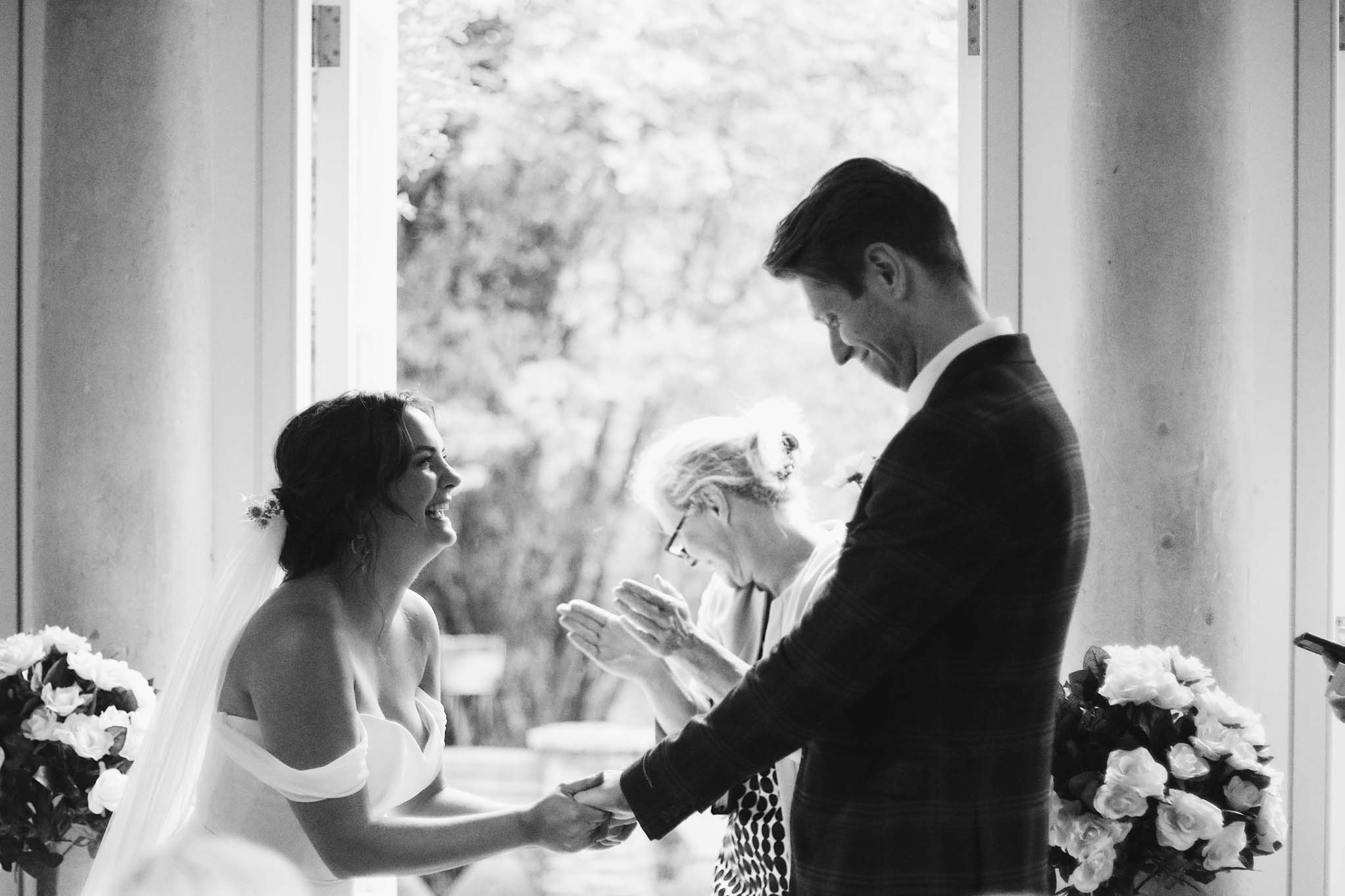 Wedding couple exchange vows, Temple of Minerva