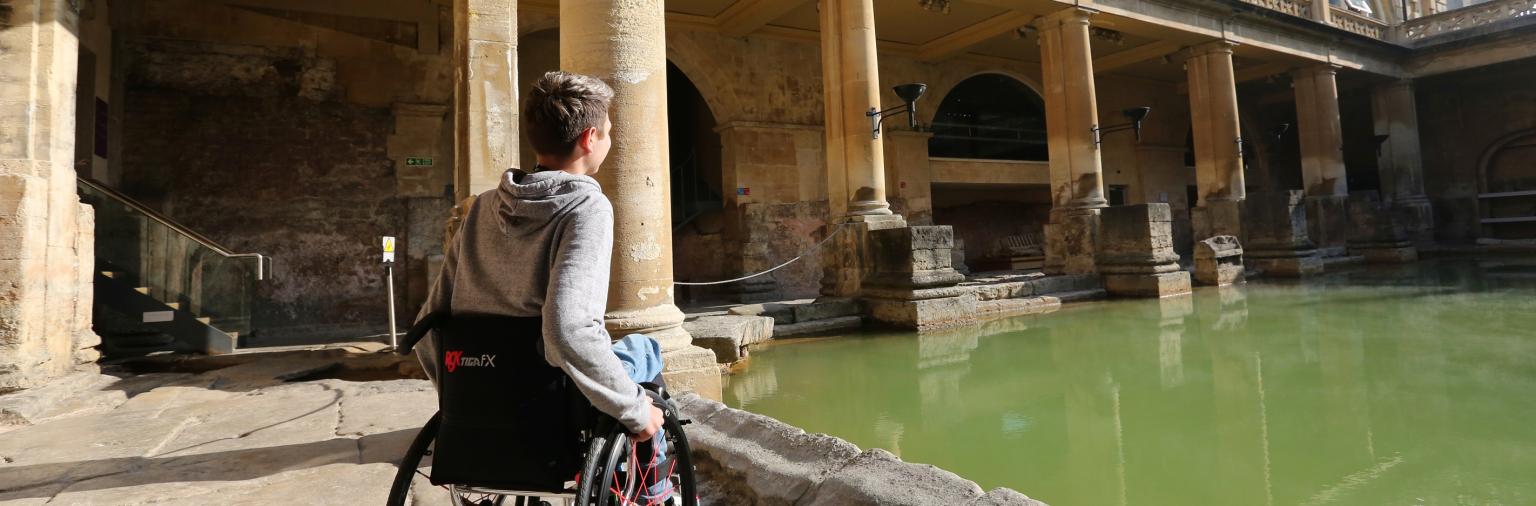 Visitor viewing the Great Bath